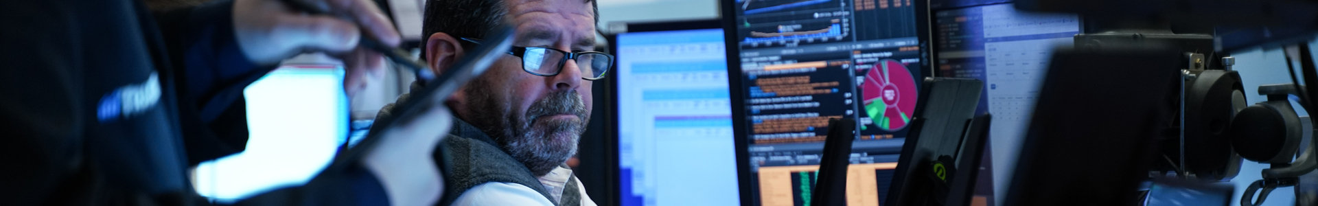 A trader at the New York Stock Exchange