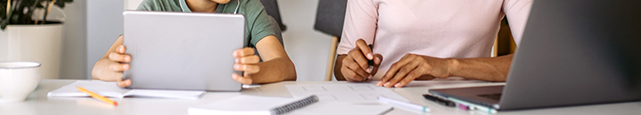 Father and son learning financial literacy