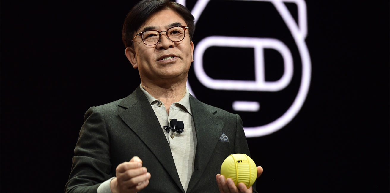 Samsung Electric President and CEO of Consumer Electronics Division H.S. Kim displays Ballie, an AI enable companion robot