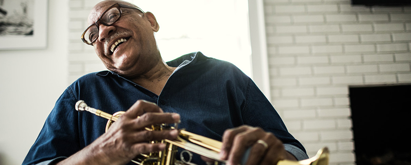 Old man and his trumpet