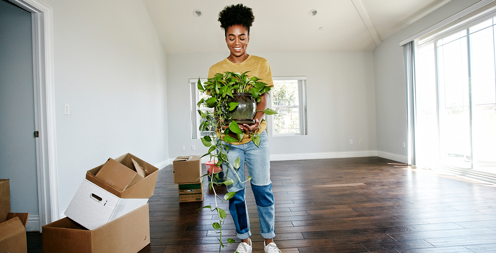 Young lady moving into her new home