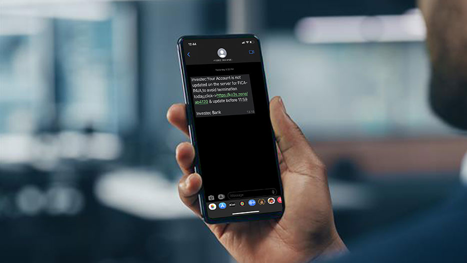man receiving a phishing scam on his phone