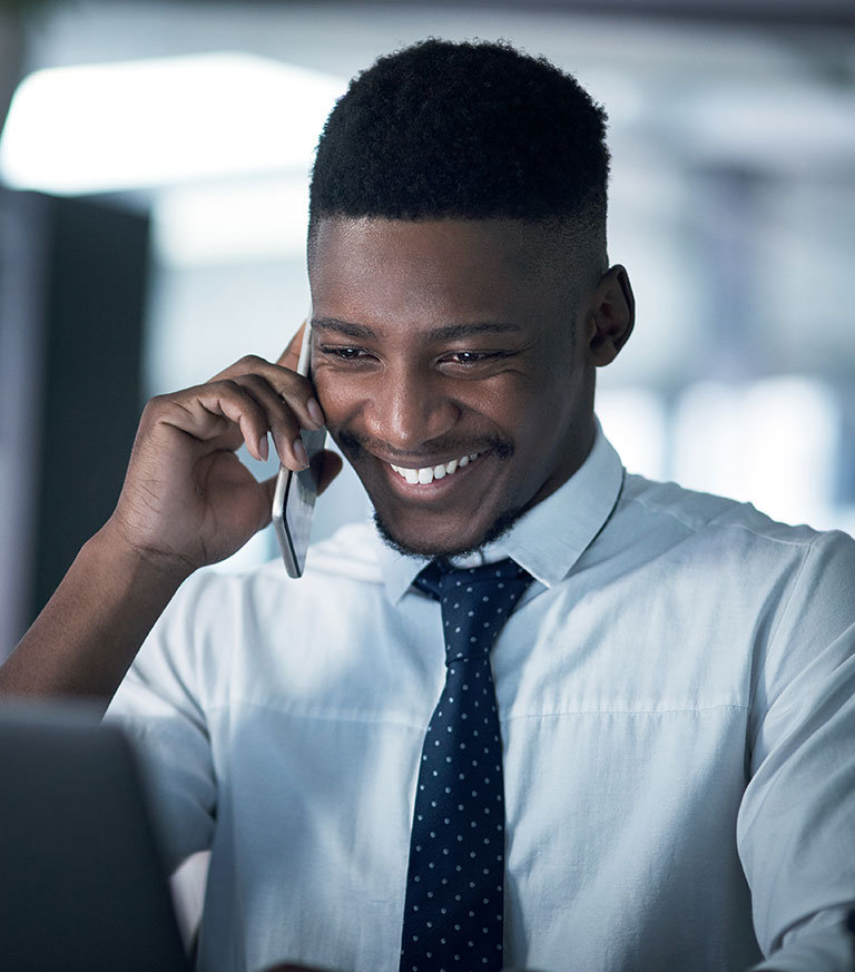Young professional bank account | young man on their tablet in the office