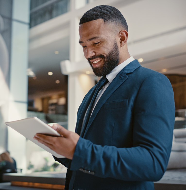 Business man checking tablet