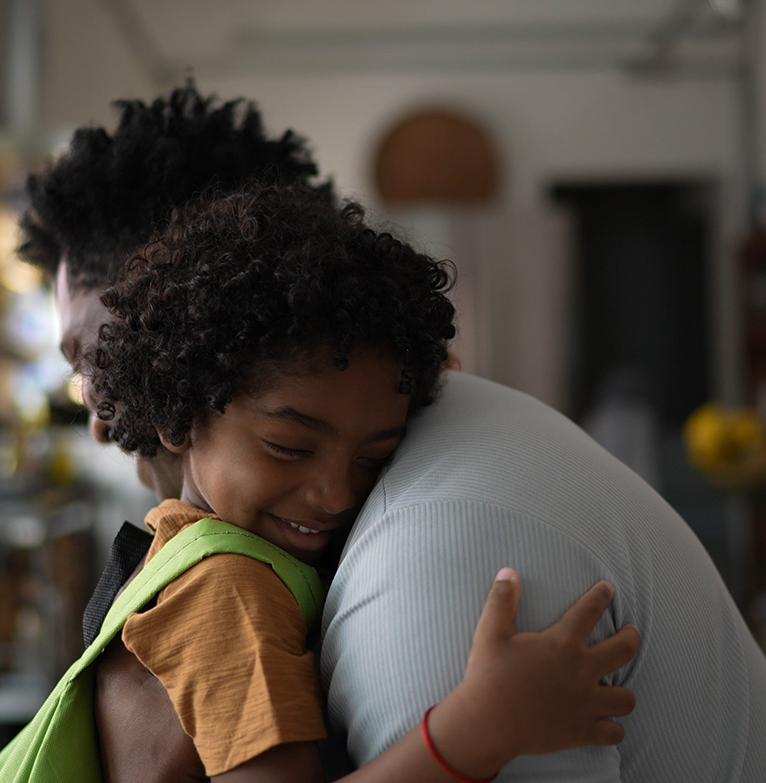 Father and son hugging