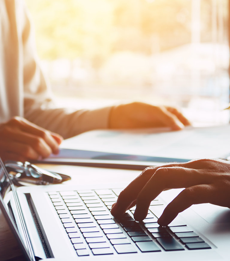 Young professional bank account | young man on their tablet in the office