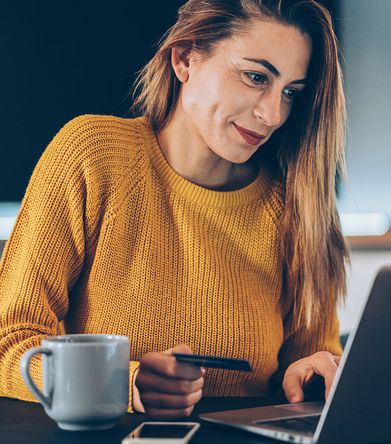 Lady shopping online with her Private Bank Card