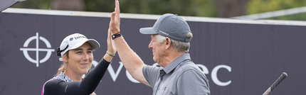 Investec sponsored pro, Ivanna Samu, shares a high-five with Investec executive Richard Wainwright