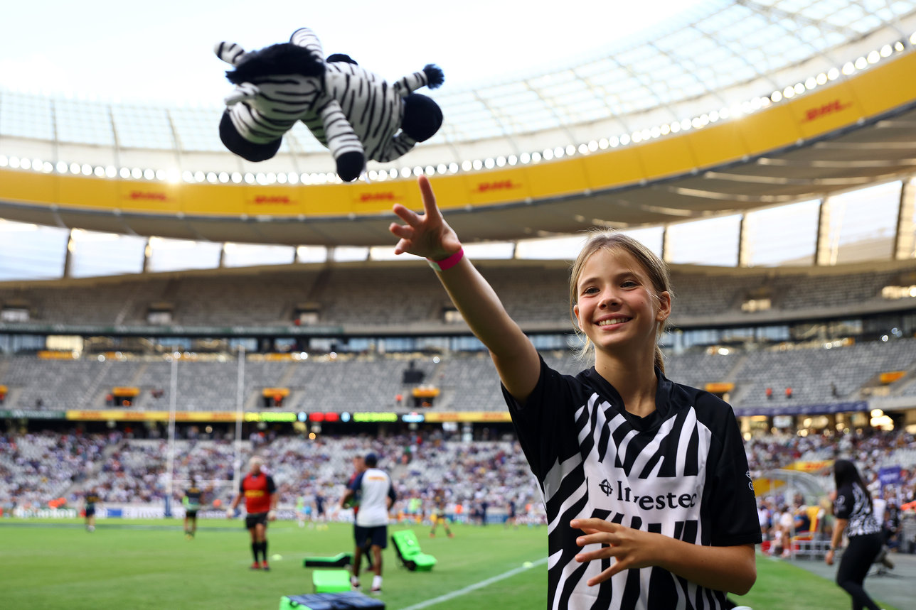 Investec Champions Cup - Young supporter in Investec branded shirt