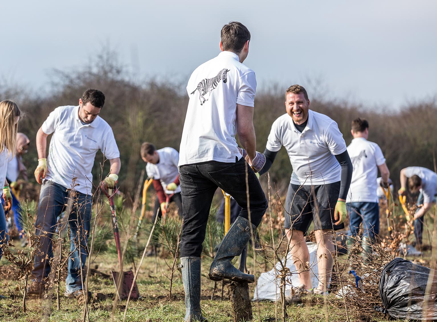 Investec volunteers cleaning local park
