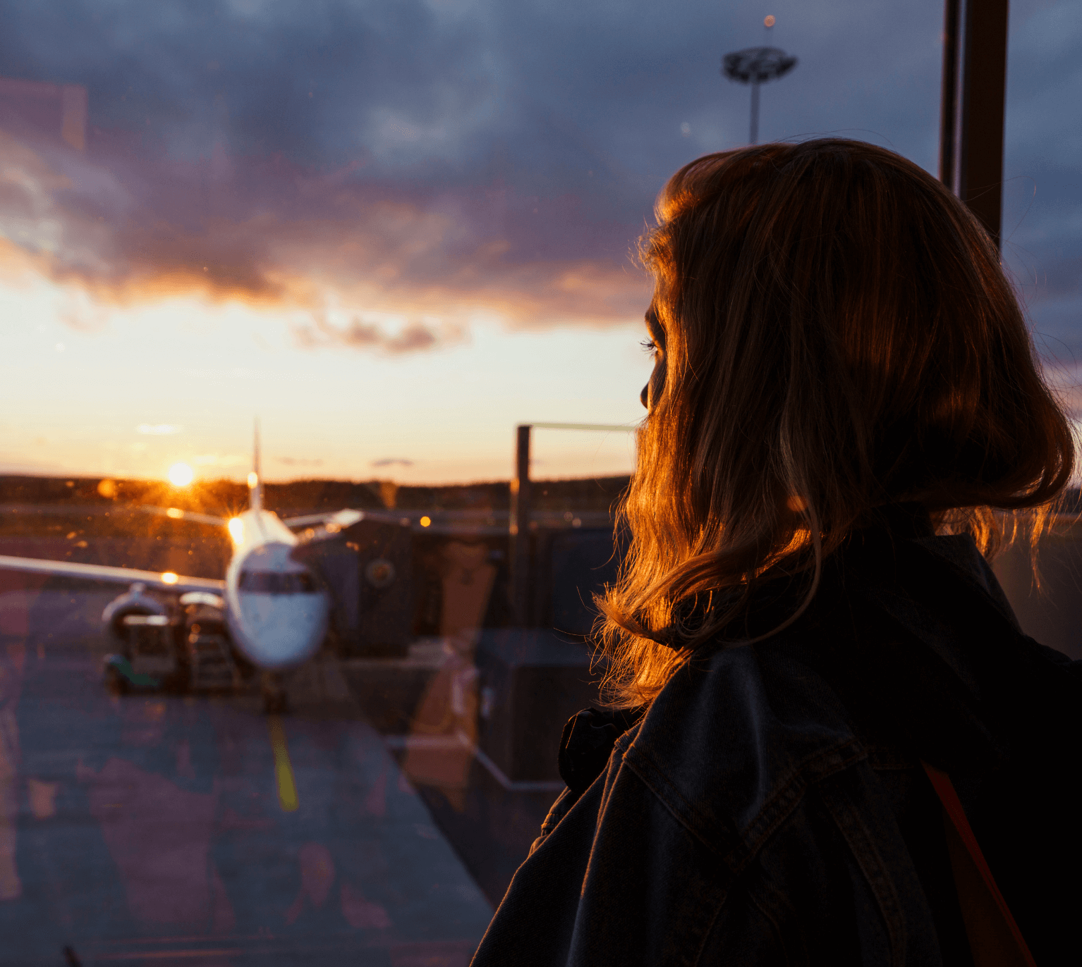 A lady waits to board an aircraft