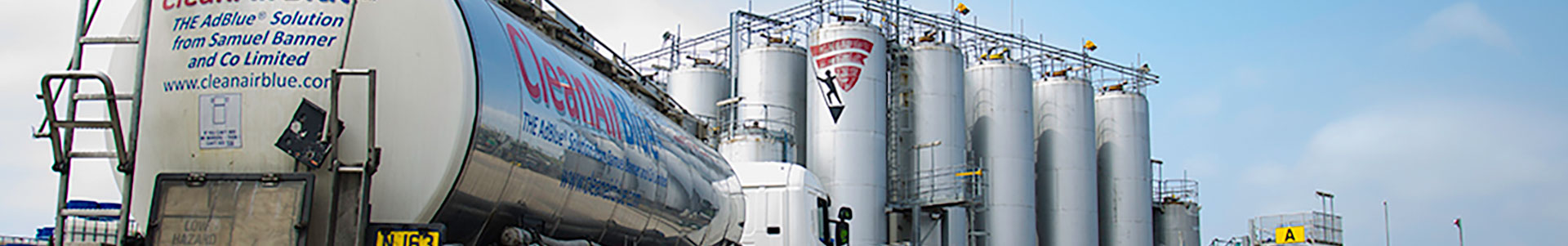 truck in front of cylinders