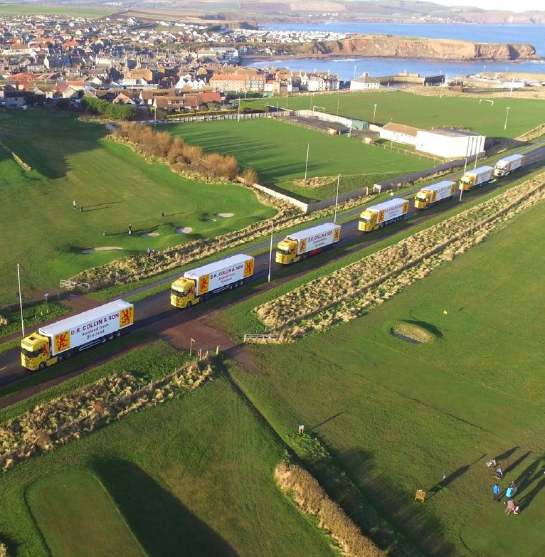 D.R. Collin & Son seafood lorries driving out