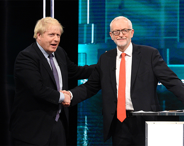 Boris Johnson and Jeremy Corbyn shake hands on TV debate