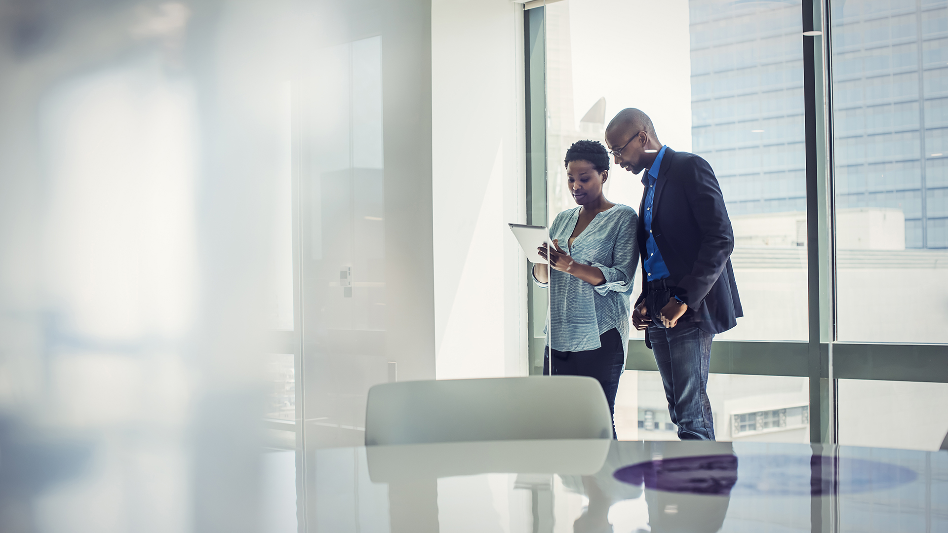 Private equity firm employees in conversation