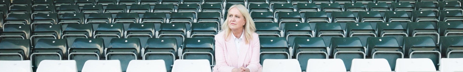Leicester Tigers CEO Andrea Pinchen sitting in a stand at Welford Road