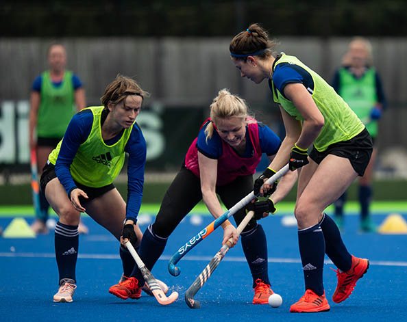 GB Hockey player Hollie Pearne-Webb and the team