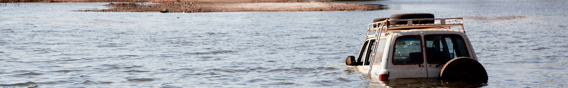 Jeep sinking in river