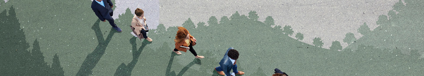 Volunteers painting over graffiti wall