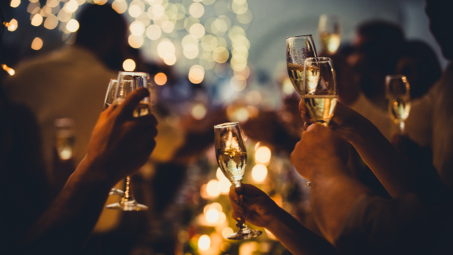 Friends with champagne glasses on new years eve