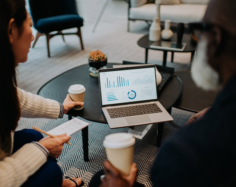 People discussing their business over coffee