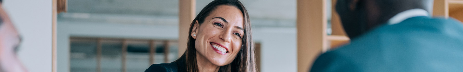 Female business leader meeting people to help them with their business