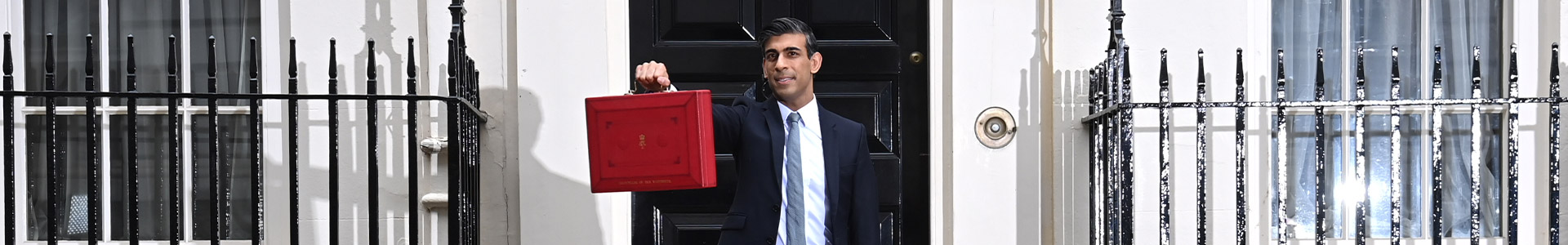Rishi Sunak, Chancellor of the Exchequer, holding his budget case outside Downing Street