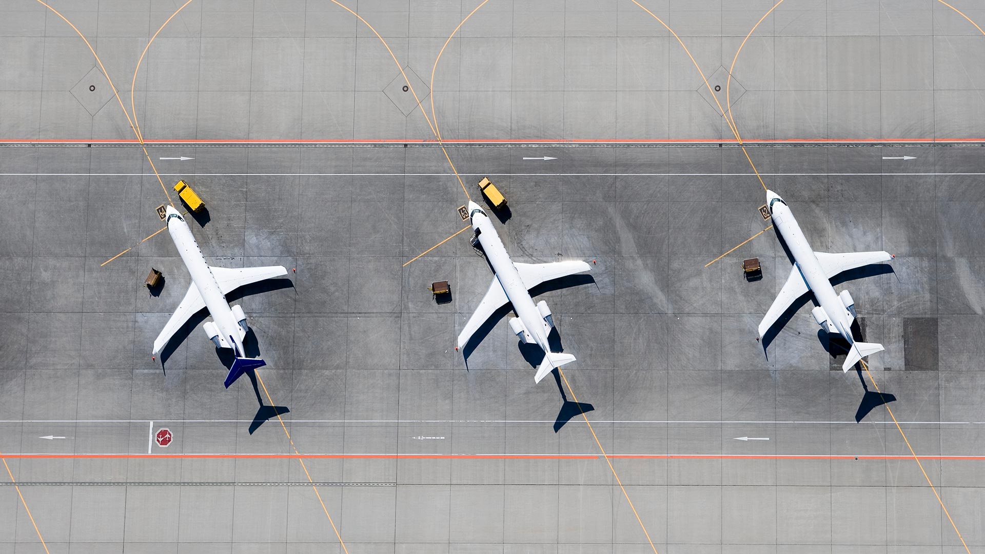 Aeroplanes in line on runway
