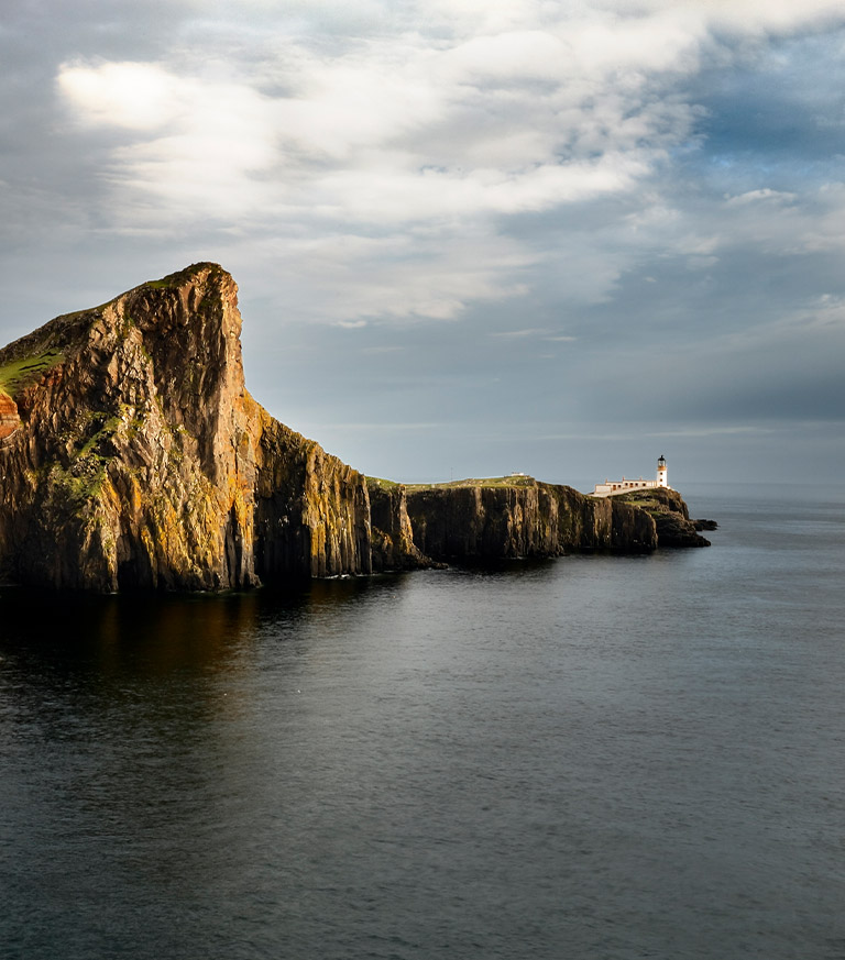 Lighthouse at the end of cliffs