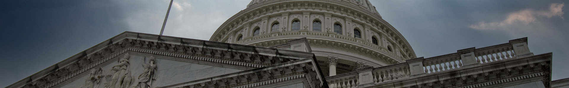The United States Capital building with dark skies