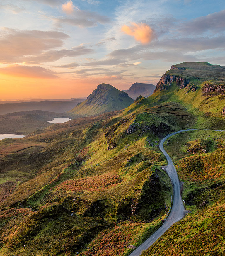 Winding road going through mountains