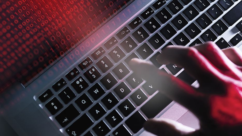 Fingers typing on a keyboard