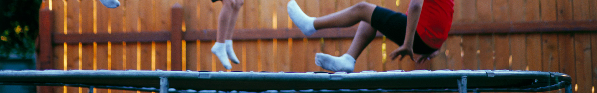 Children bouncing on a trampoline