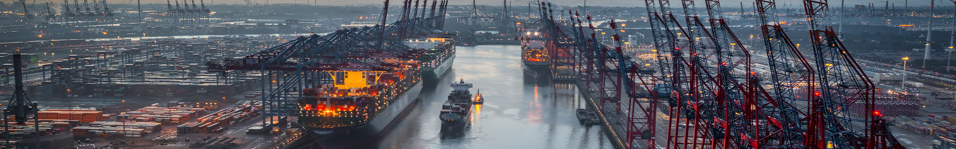 Aerial view of a container terminal with large container cargo ships
