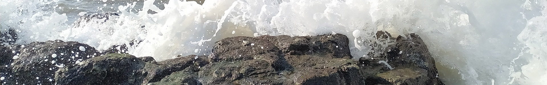 Waves crashing into rocks