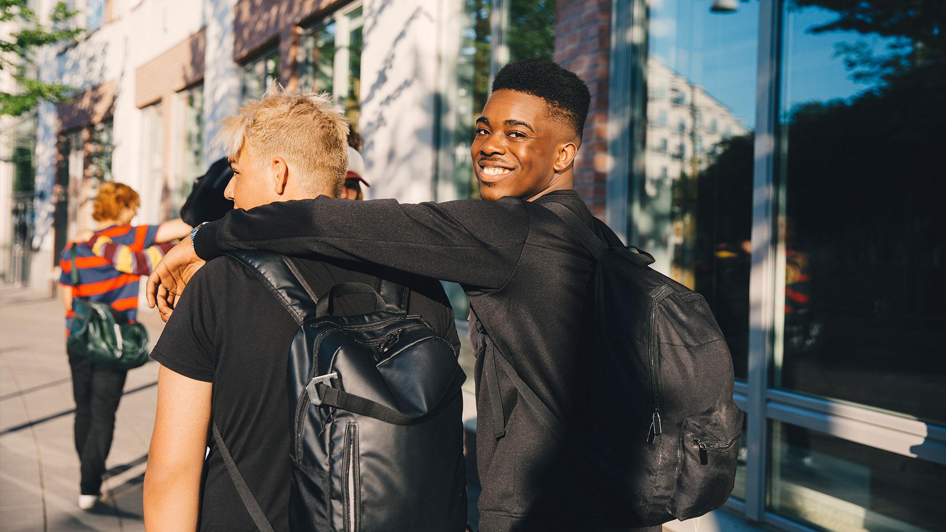 Friends walking together down the street