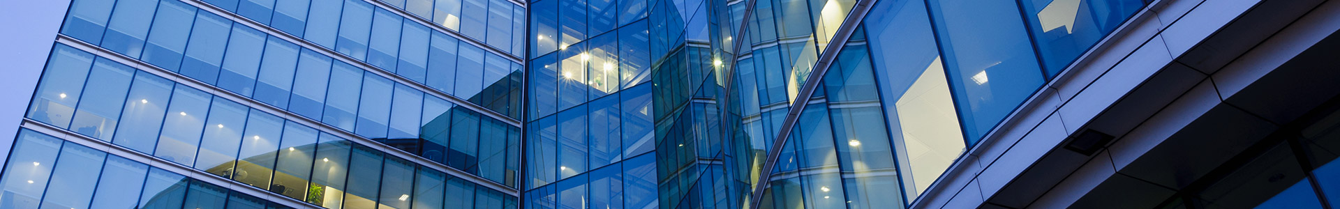 Close-up of glass fronted office building