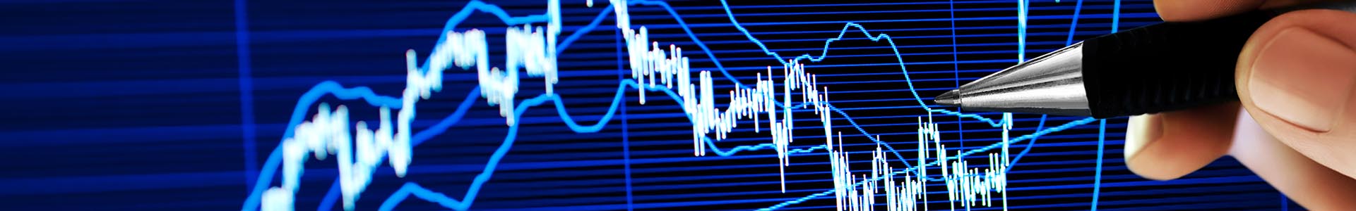 Person analysing market performance on screen