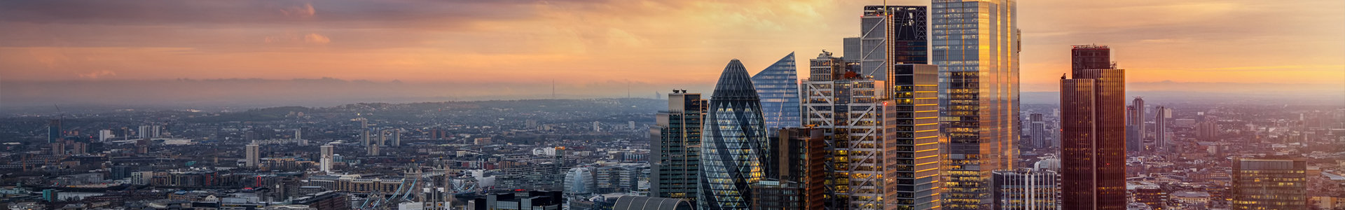 An elevated view of the London skyline at sunrise