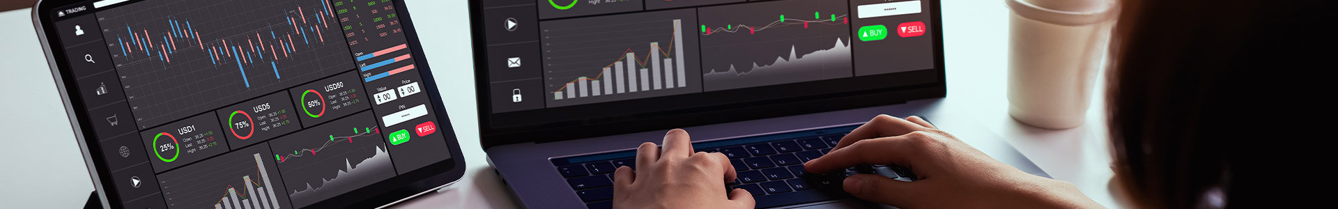 Person checking fx rates across multiple screens