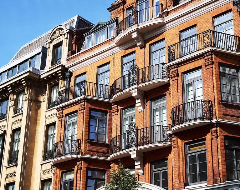 Red and yellow bricked buildings with flats