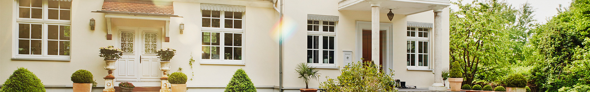front of a luxury home