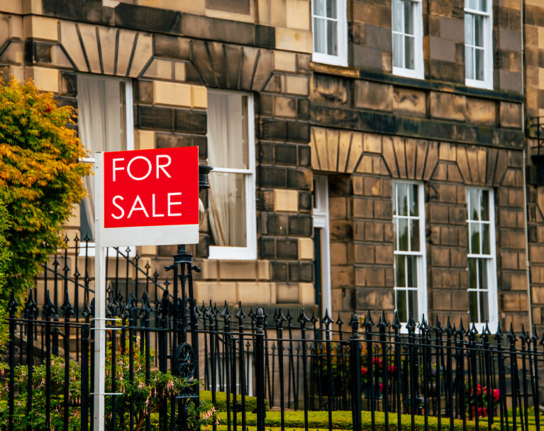 For Sale sign outside a property