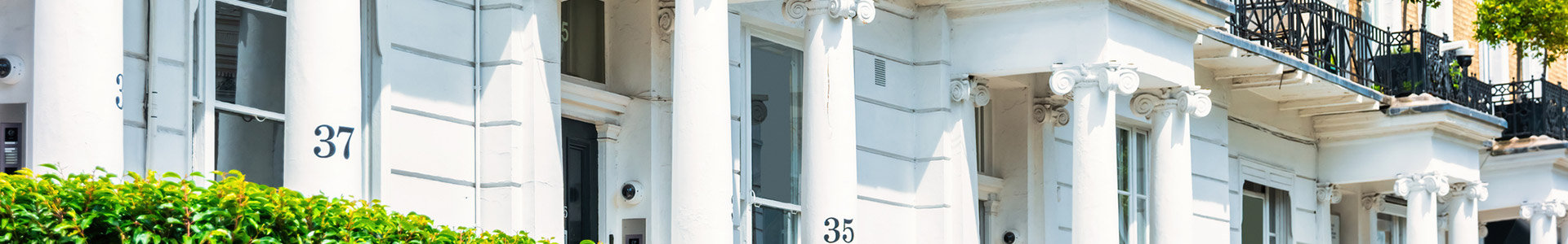 Front of white terraced houses