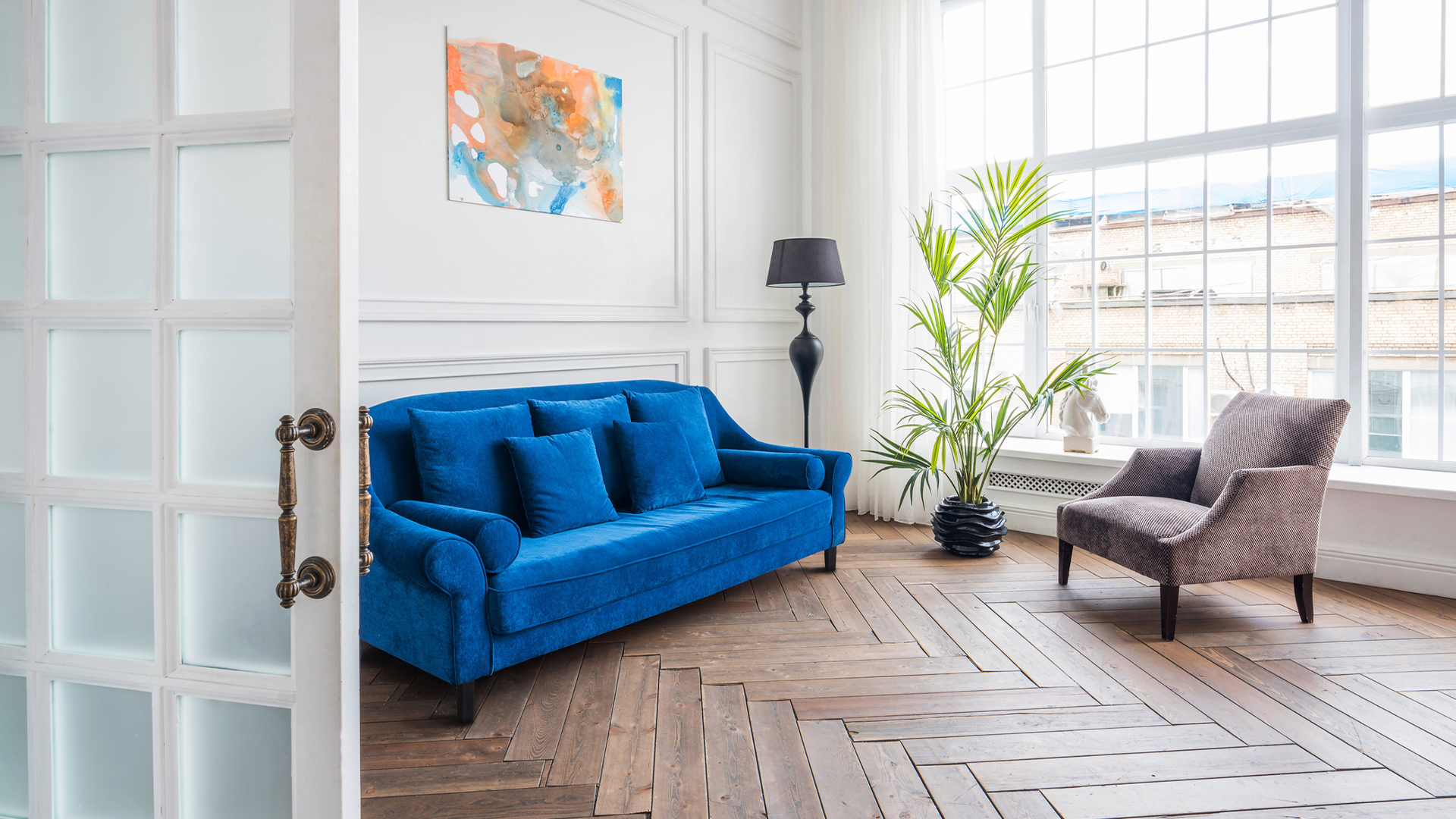 Seating area in open lounge area with wooden flooring