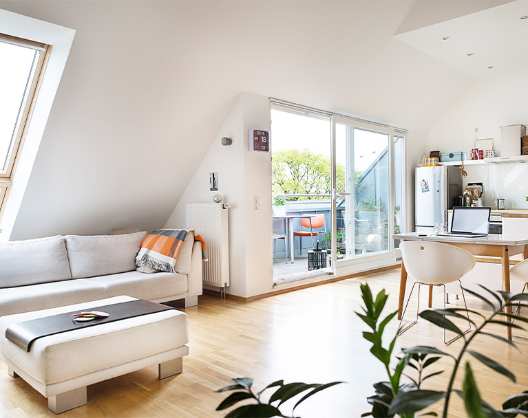 Open plan living and working space in a loft conversation
