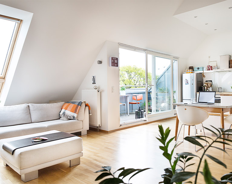 Open plan living and working space in a loft conversation