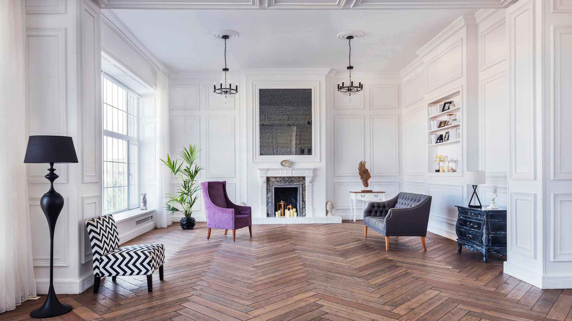 open spacious sitting area with chairs and open fire
