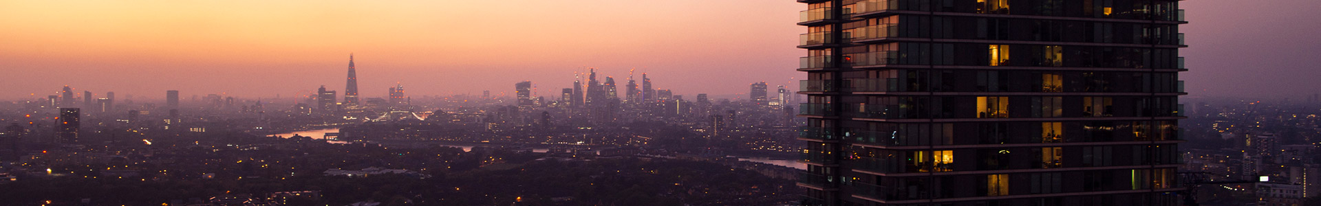 Towr block of flats with London city in the background