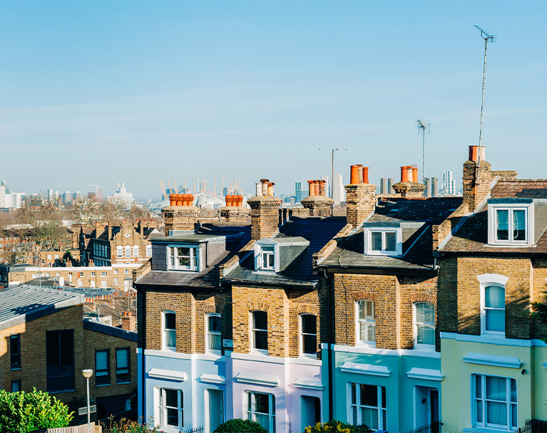 View of terraced house with city in the background